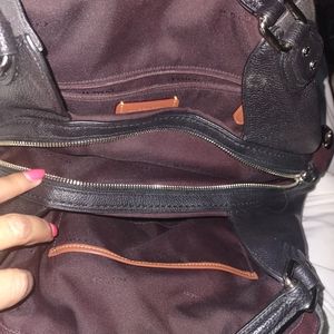 Coach purse with gray and red stripe